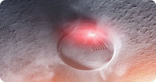 Photoelectric smoke alarm installed on the ceiling of a Mansfield home